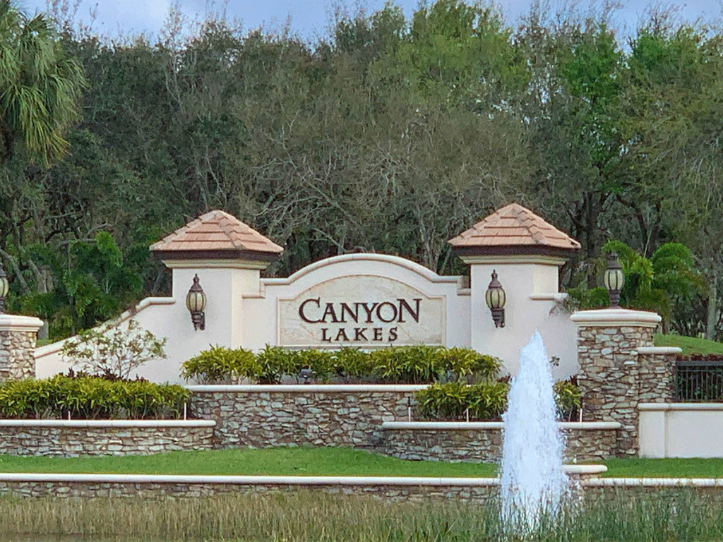 Fountain at the entrance to a gated Boynton Beach community