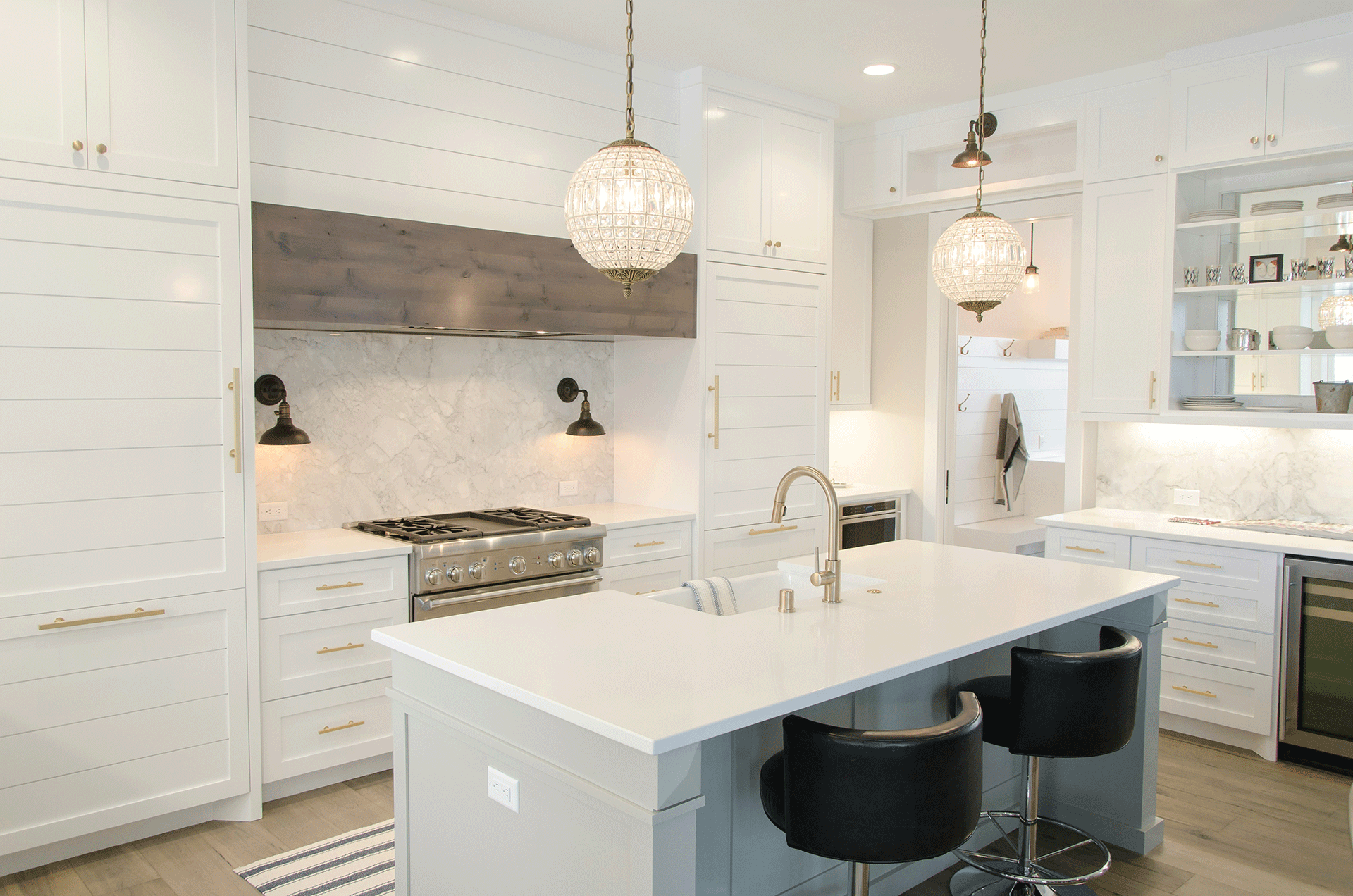 Bright white kitchen with an island in a Palm Beach home